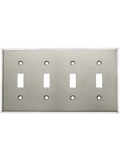 Classic Four Gang Toggle Switch Plate In Brushed Stainless.